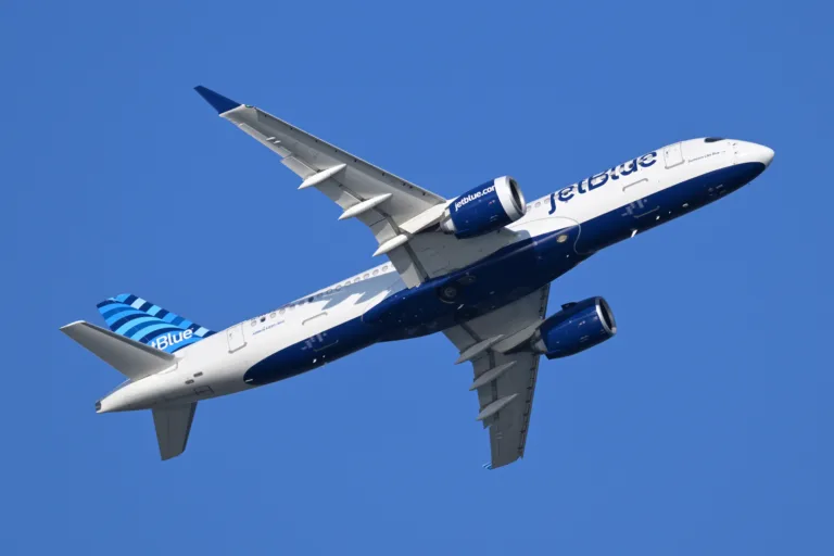 JetBlue Airbus A220-300 N3195J departing Boston Logan Airport in August 2025